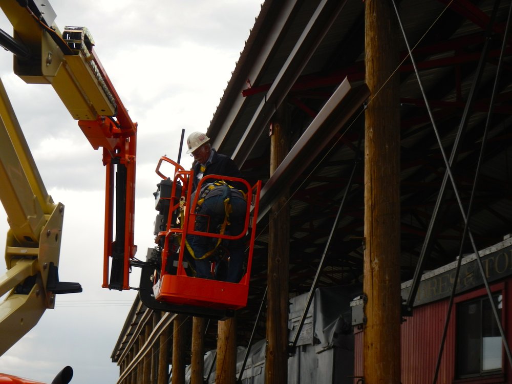 Friday - 4 of 7 rows of girts have been installed on the car shelter.  Work is planned to  continue during C & D.  Team Leader Chuck Dueker and Daniel Schmidt have developed a system!.jpg