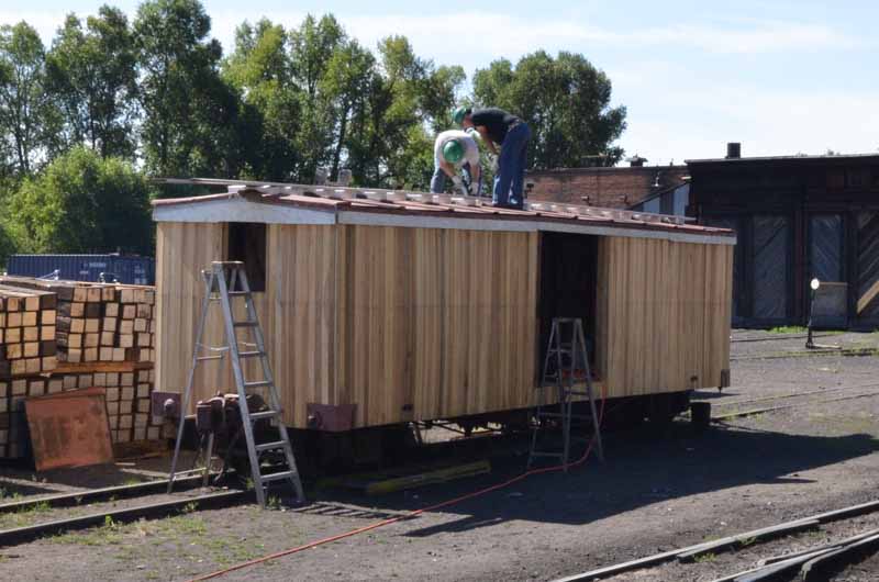 2019.07.31 Putting the roof walks on box car 3476 (1 of 1).jpg