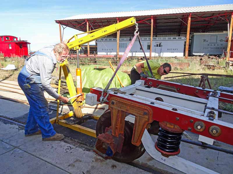 2019.08.06 Lifting up the new truck frame to receive the wheel set (1 of 1).jpg