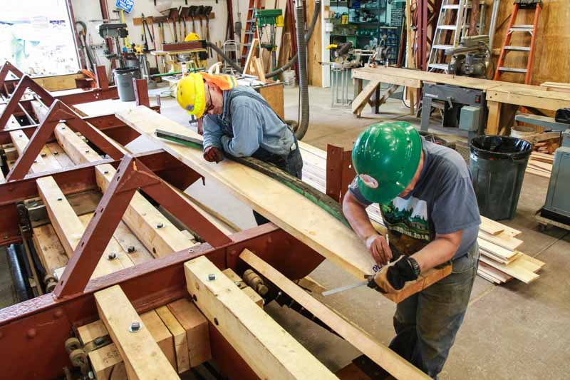 2019.08.24 Tracing the outline of a roof support from OY onto new wood (1 of 1).jpg