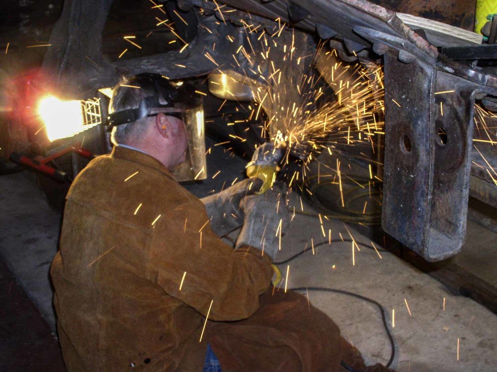 2019.09.23 Grinding away on the underside of the Gramps tank car (1 of 1).jpg