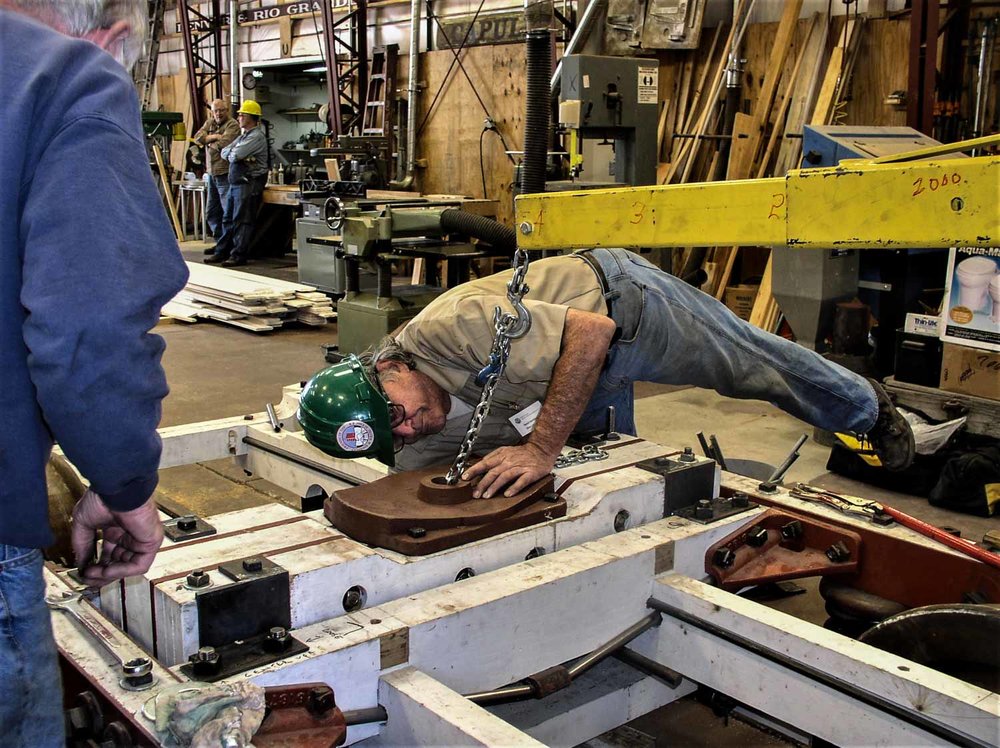 2019.09.24 pt Lowering the new center sill with the bearing plate (1 of 1).jpg