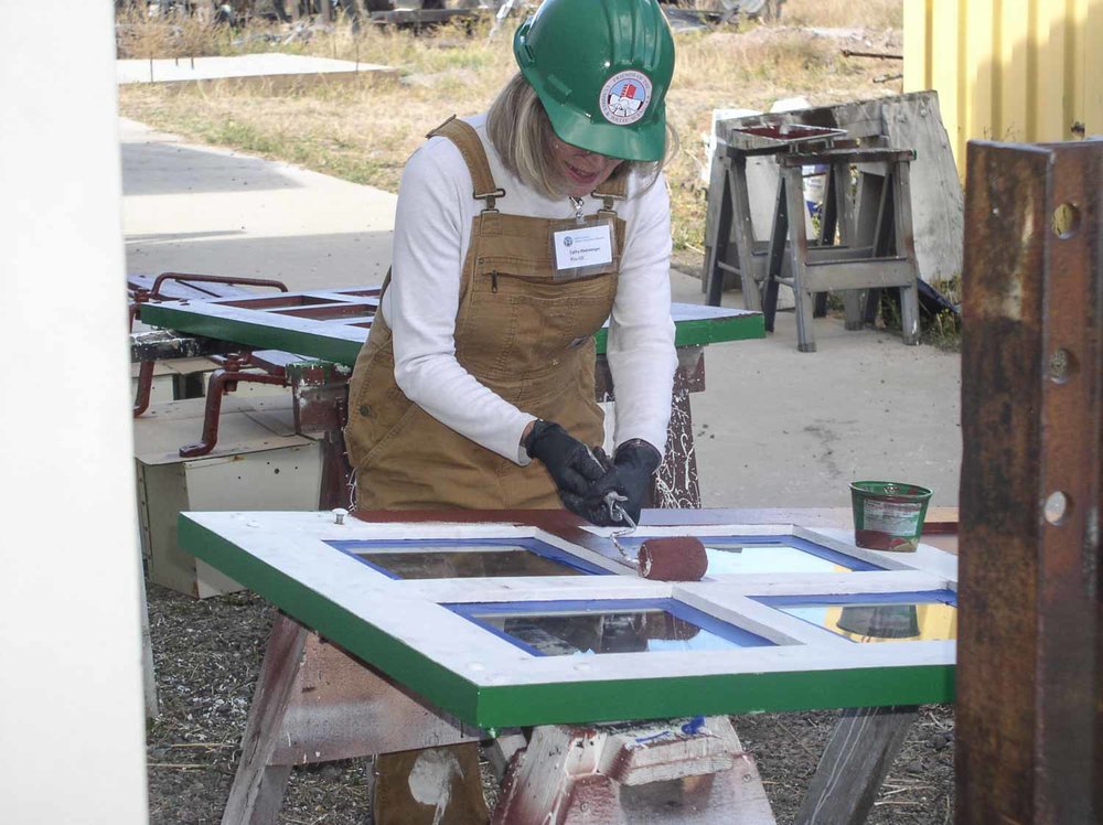 2019.09.26 oy Applying the red, outer paint to one of the windows of OY (1 of 1).jpg