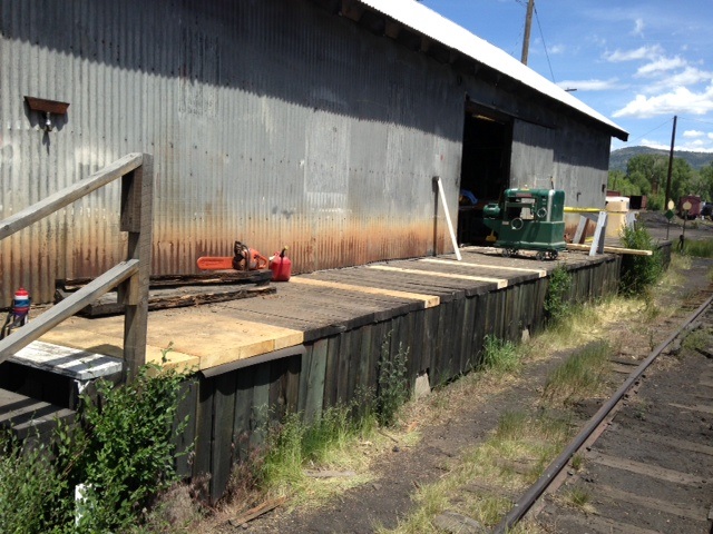 The volunteers even installed some new boards in the deck behind the wood shop.jpg