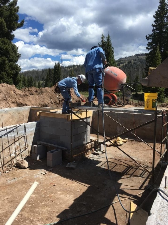 8 Pouring concrete at the fireplace area.jpg