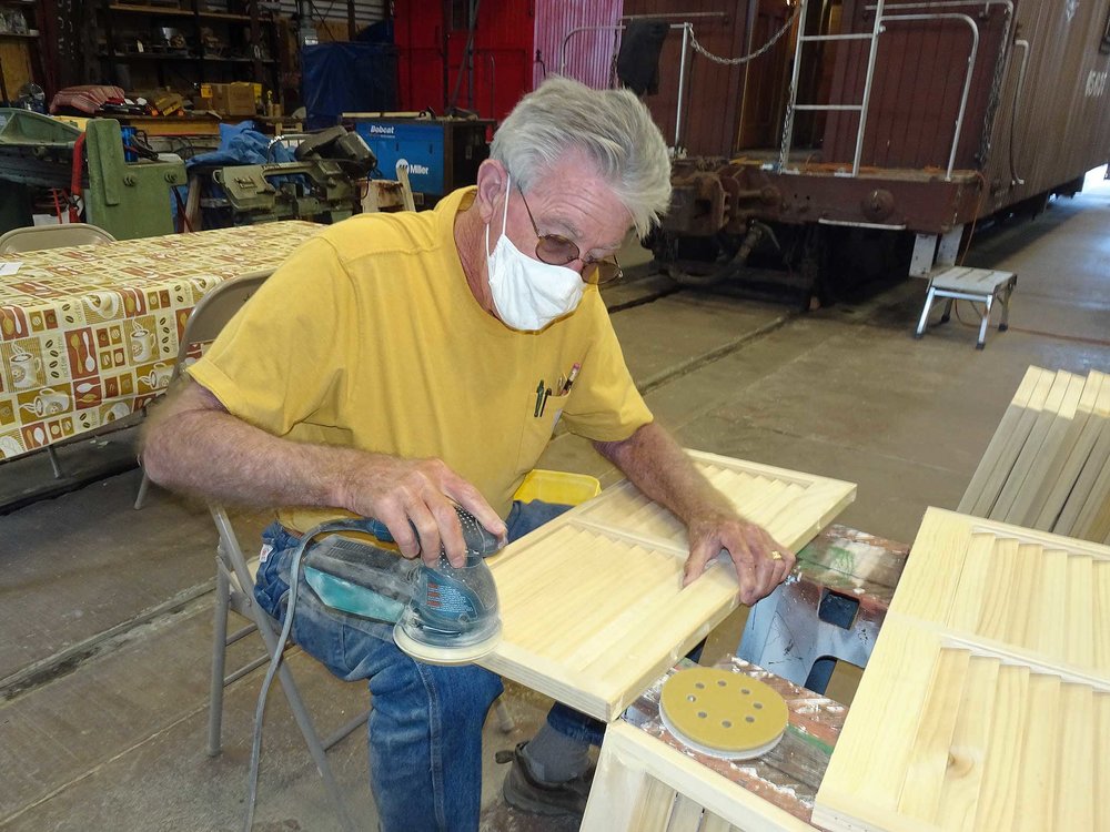 Sanding on the window shutters for the tourist sleeper.jpg