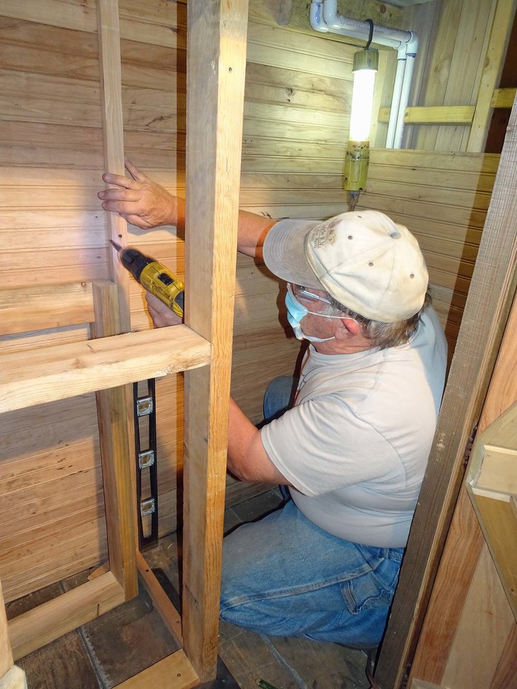Working on the wood work inside either the caboose or tourist sleeper.jpg