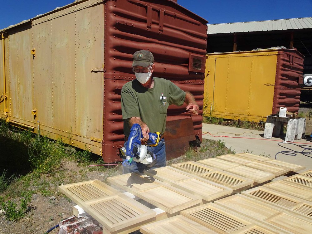 The sanded shutters are now getting a coat of urathane.jpg