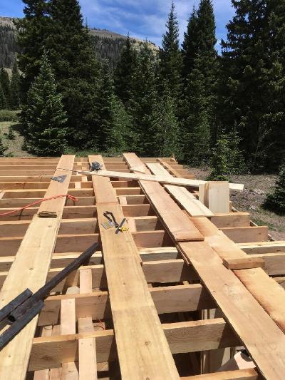 Looking at some of the boards over the second floor joists.jpg