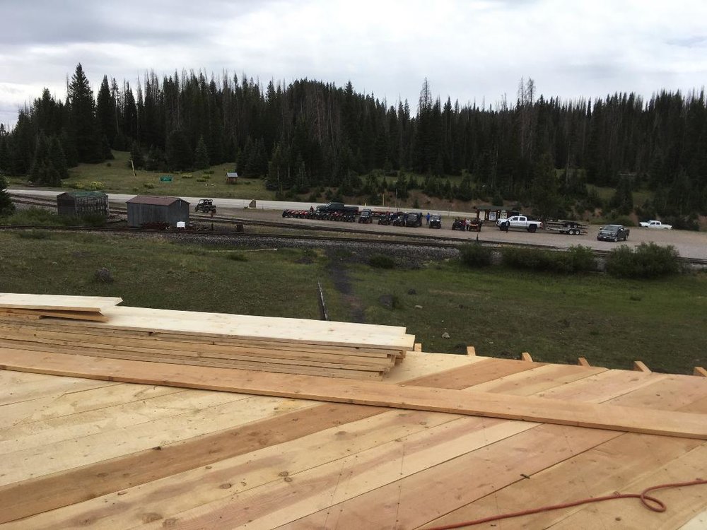 Looking over the flooring toward the Cumbres parking lot with a group of avts parked there.jpg