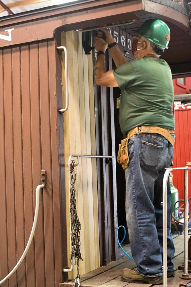 Using the nail gun to attach the outer sheathing on the end of 5635 (1 of 1).jpg