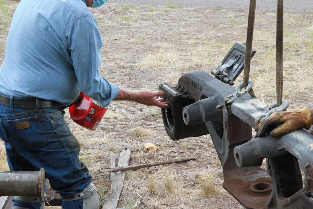Applying grease to the axle pocket prior to installing (1 of 1).jpg
