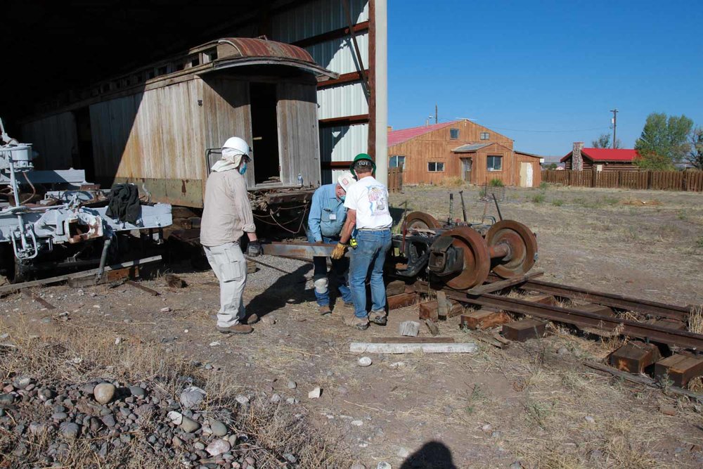 The crew is placing a large beam to work the bolster so the springs can be inserted (1 of 1).jpg