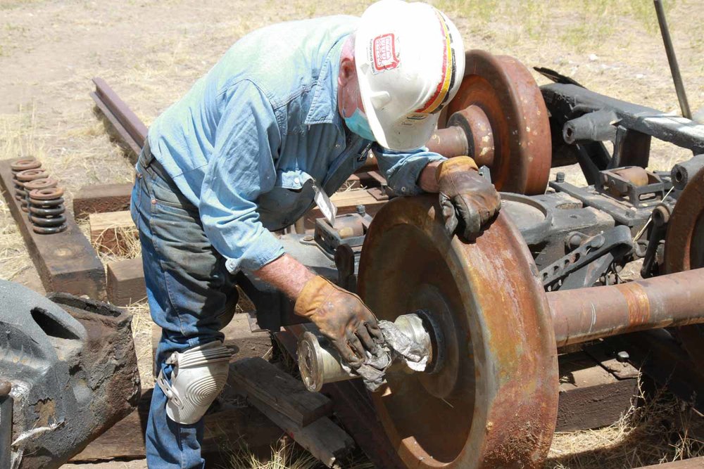 Cleaning the axle end prior to installing the side bolster (1 of 1).jpg