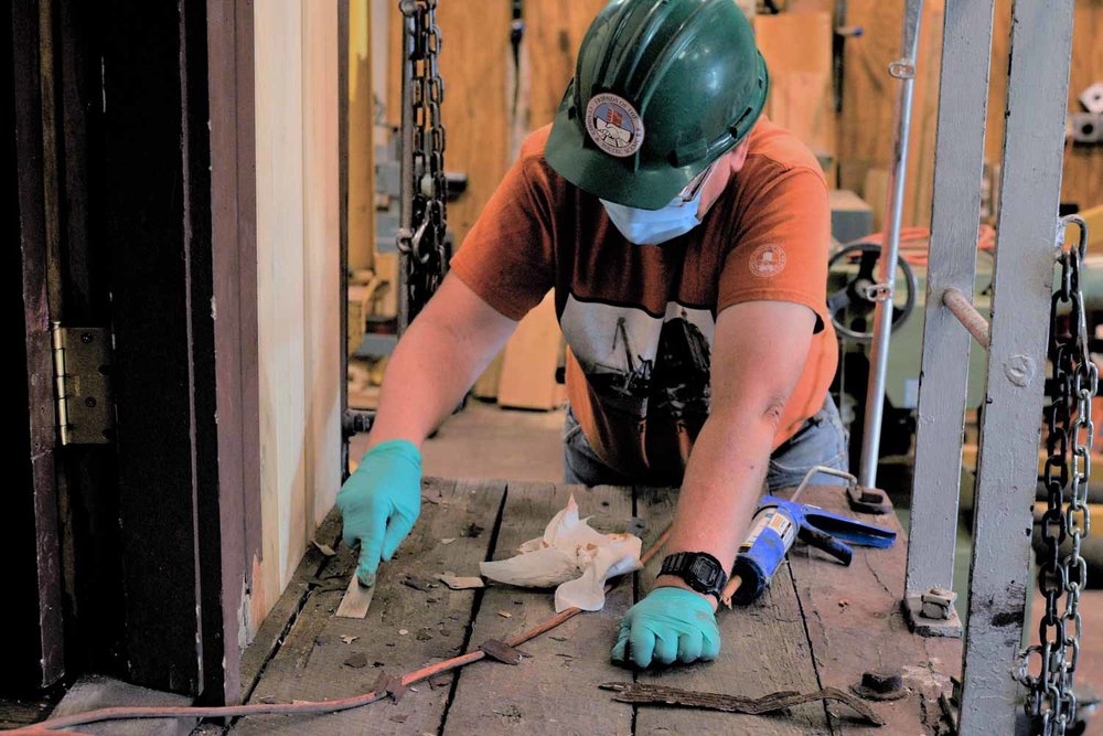 Scraping the wood on a platform on 5635 to get ready for painting (1 of 1).jpg