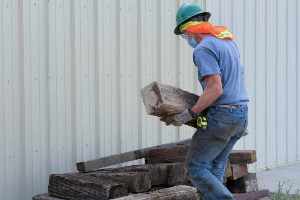 Stacking up this old wood  (1 of 1).jpg