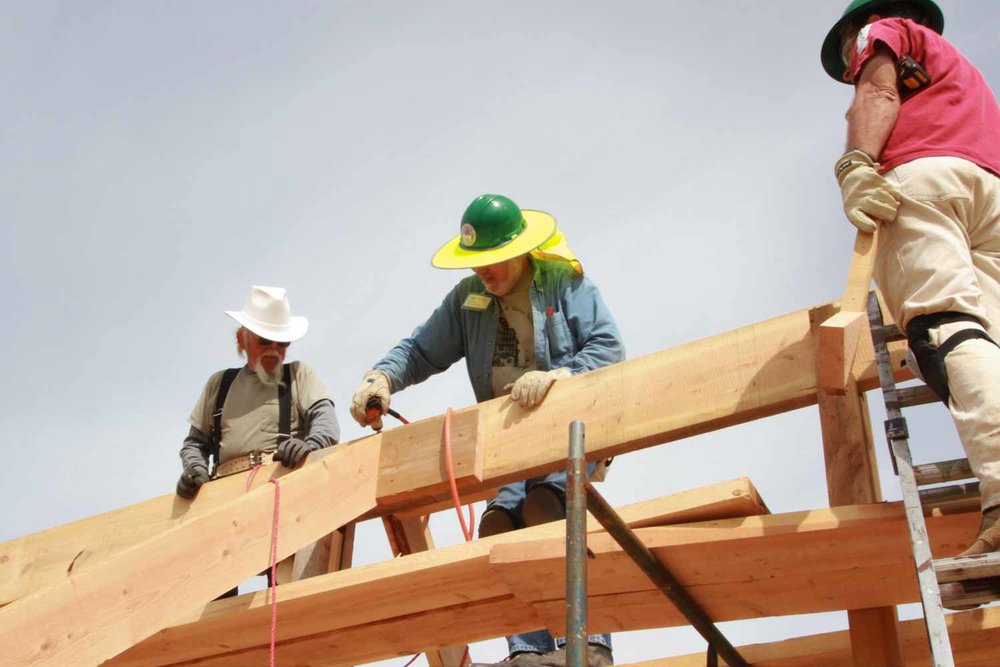 c Attaching a rafter to the center beam of the house (1 of 1).jpg