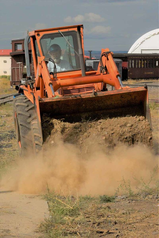 The loader is scraping up the dirt for a project (1 of 1).jpg