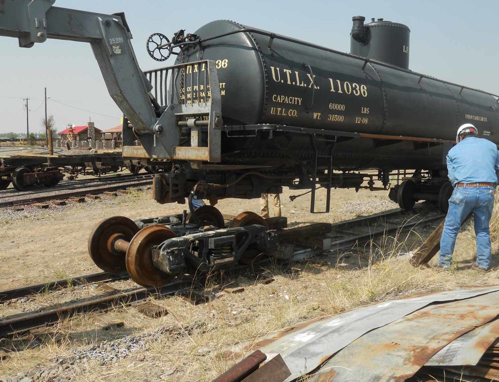 With the rebuilt truck ready to roll under, the cribbing is removed (1 of 1).jpg