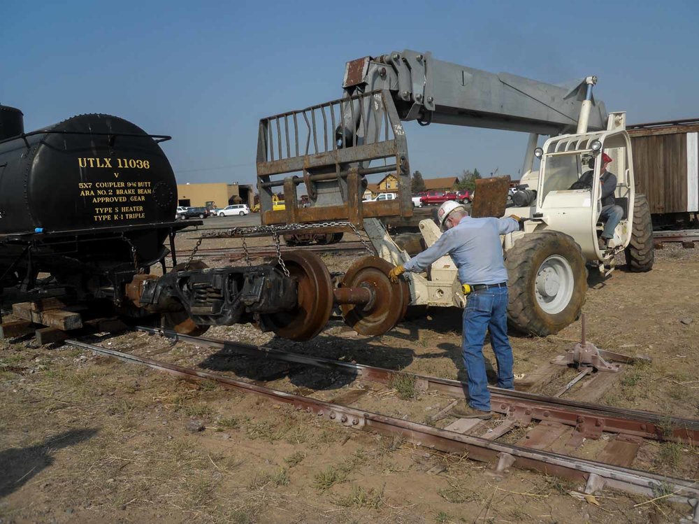 This heavy duty fork lift is setting the rebuilt truck down (1 of 1).jpg