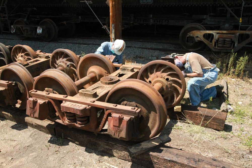 Inspecting the bearings on one of the spare trucks (1 of 1).jpg