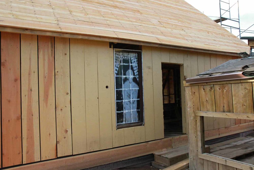 The back of the house showing one of the windows with the art work (1 of 1).jpg