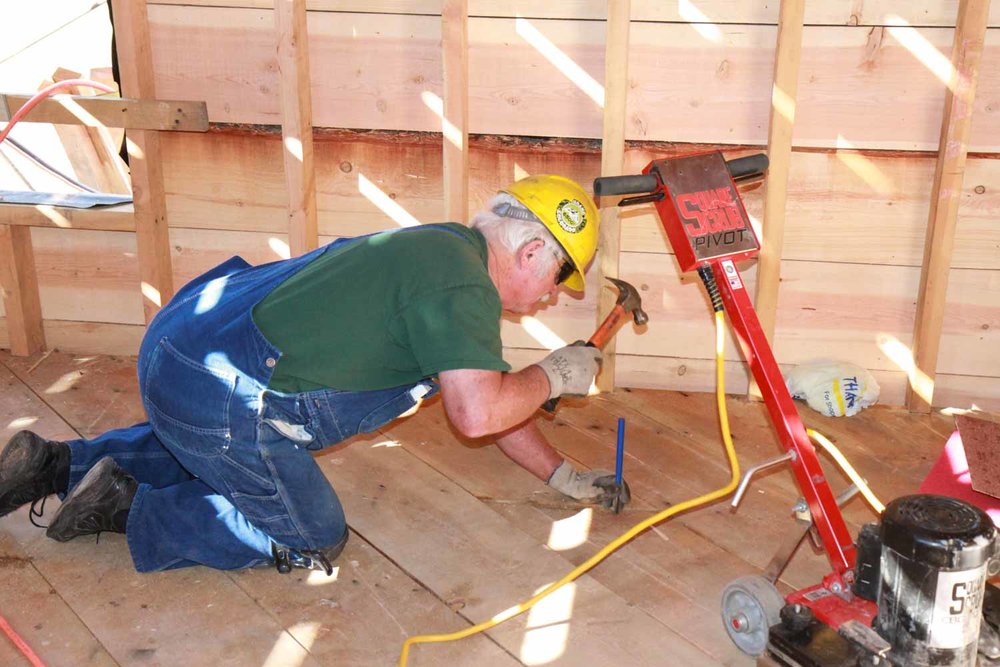 OK is he cutting out a groove in the flooring (1 of 1).jpg