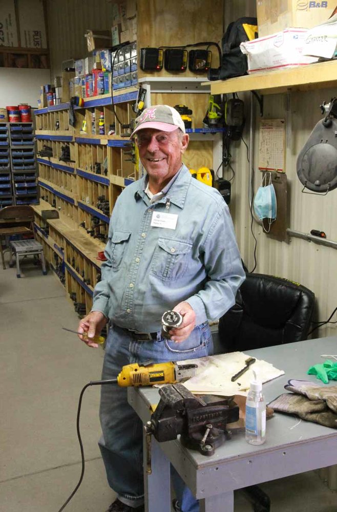 A happy Friend working on a door knob (1 of 1).jpg