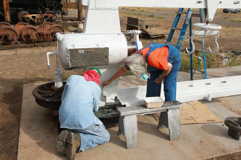 Work continues on the wheel press as the primer coat is applied (1 of 1).jpg