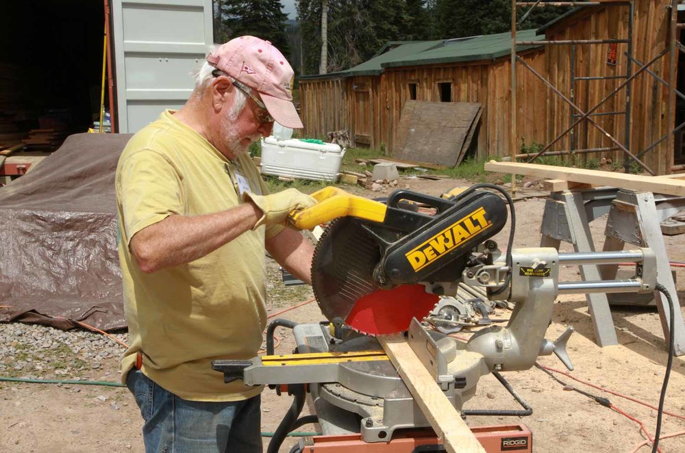 Using the table saw to cut a piece of wood to length (1 of 1).jpg