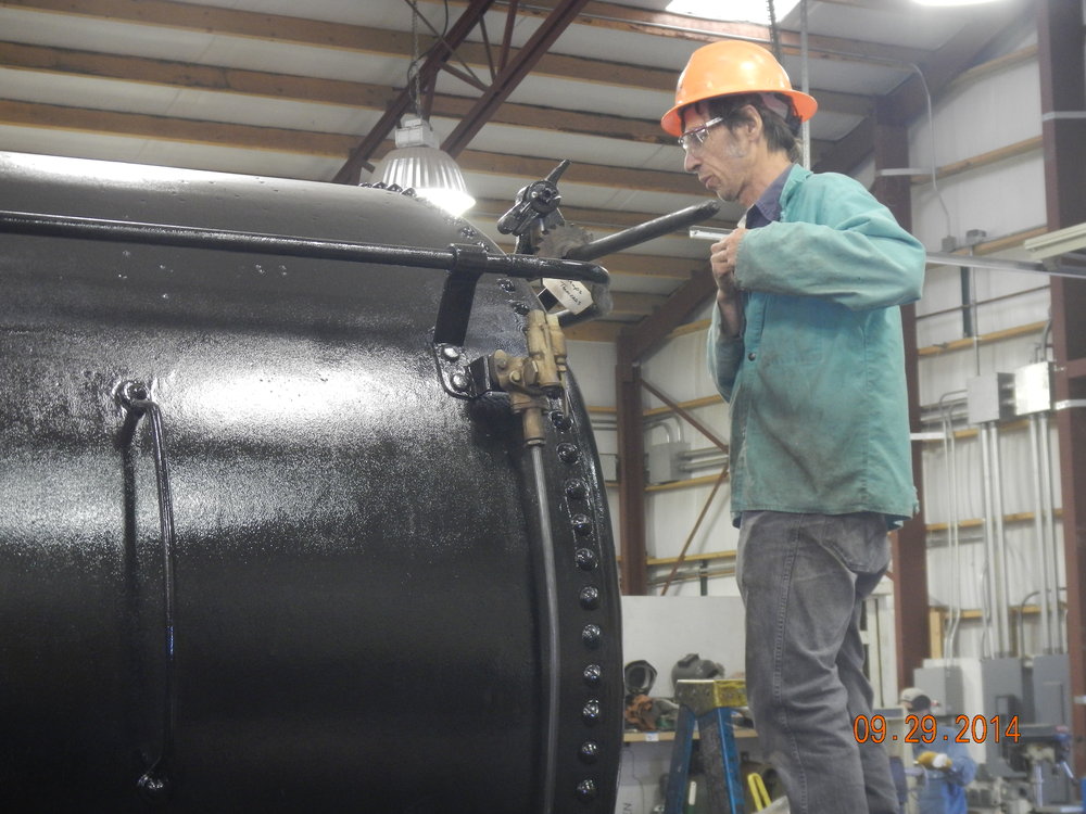 Chris is replacing missing tank car jewelery - this is prep for the brake wheel..JPG