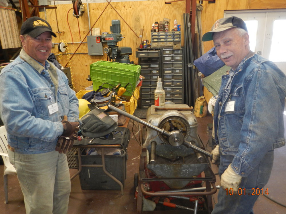 Doug Juslyn and Kevin  threaading air line pipe.JPG