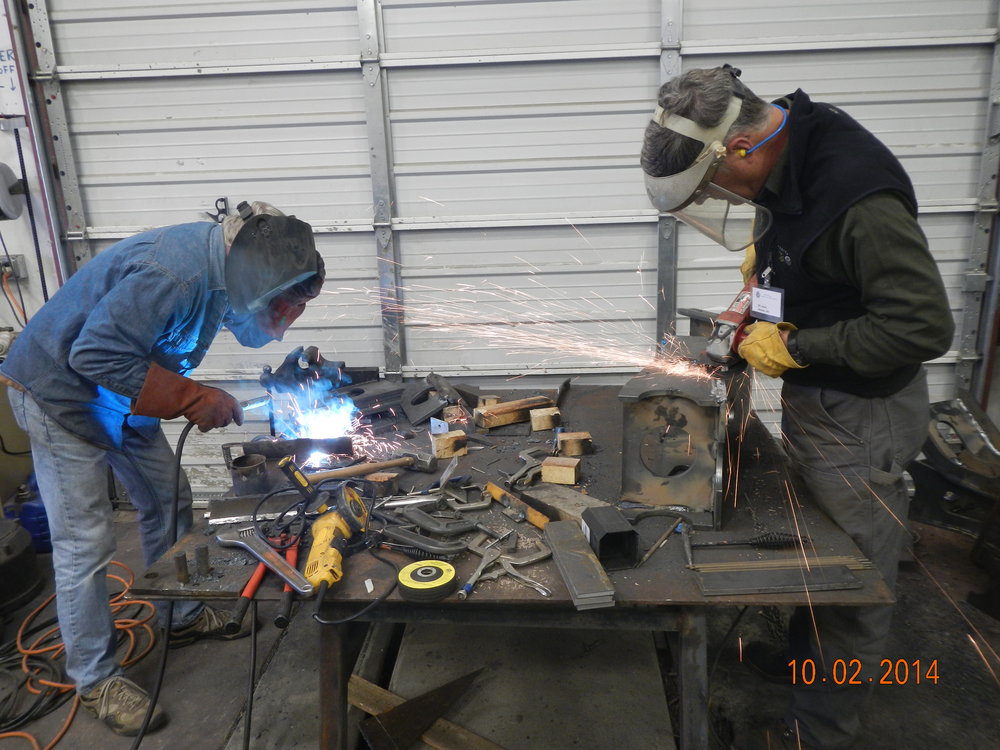 Russ welding, Bill Jones Grinding flying bolsters.JPG