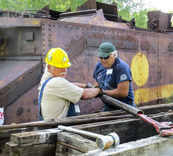 Jack Hermann and Gary Ehler. They are rebuilding the Idler flat car. Maybe they need a bigger wrench.jpg