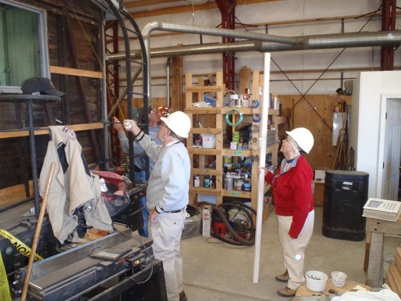 First Year Volunteers Paul and Ruth Toomey Work on Cook Car 053.jpg