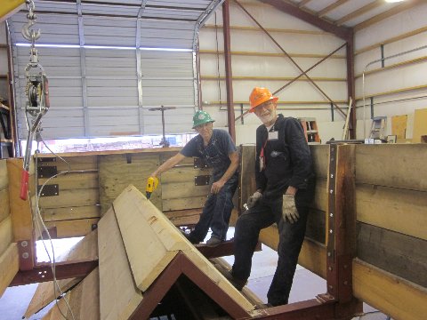 Jim Florey and Warren ringer first section of A frame wood installed .JPG