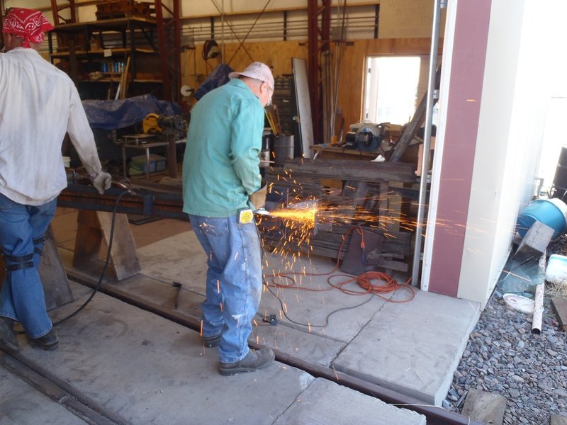 Pole Barn Truss Fabrication Team Members Firing Away.jpg