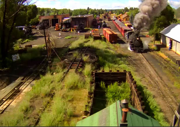 Train 216 leaves the Chama station with 288 leading 8.3.15.jpg