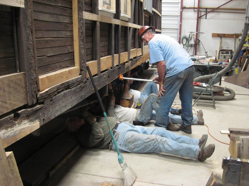 Craig McMullen's crew checks the underside of Cook Car 053.jpg