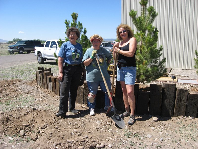 Mary Jane Marshall, Naomi Sublett and Maggie McMullen put finishing touches on CRF landscaping project.jpg