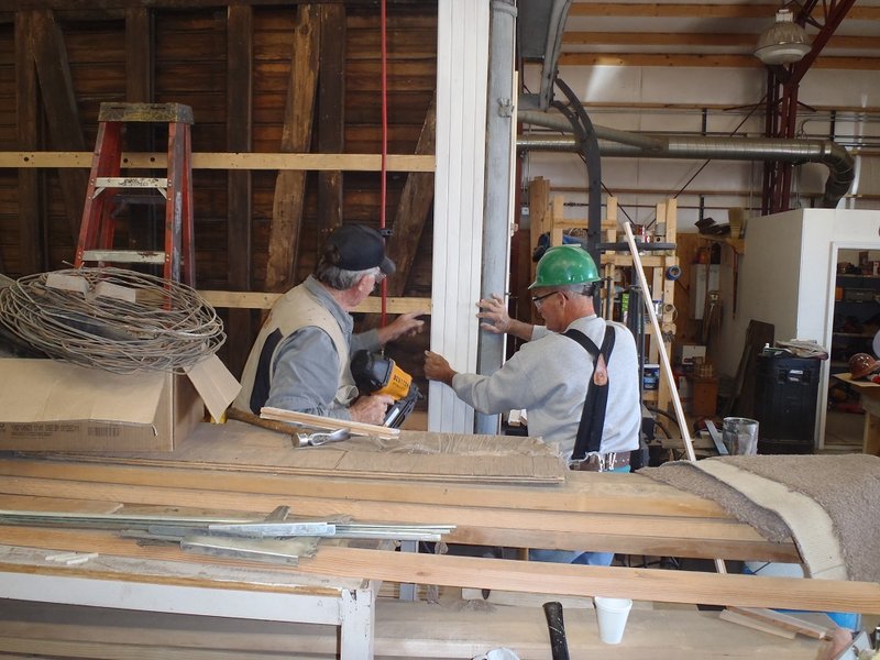 Craig McMullen and New Volunteer Carl Haueisen Place Siding on Cook Car 053.jpg