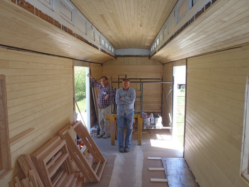 Team Leader Don Bayer and John Altshool Survey Oak-Lined Interior of RPO Car 054.jpg