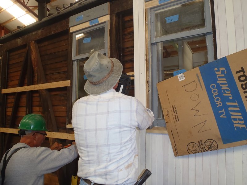 Carl Haueisen and Tim Bristow install siding on Cook Car 053.jpg