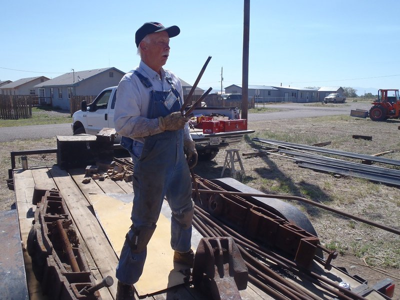 Kevin Corwin working on stock car restoration project (Antonito).jpg