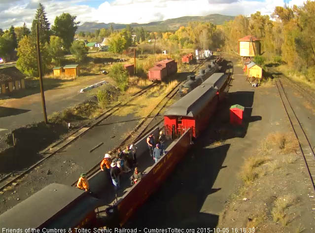 10.5.15 The open gon has riders as the train approached the depot.jpg