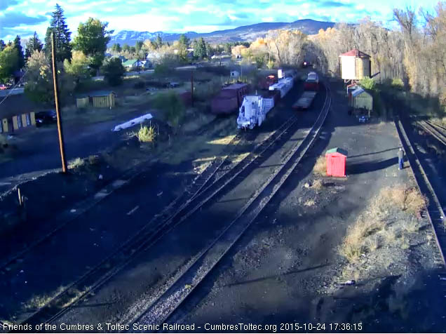 10.24.15 The headlight of 484 shines as it rounds the curve into Chama yard.jpg
