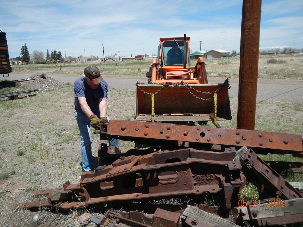 Jim McGee and Leon Driving move steel to a nw storage area..jpg