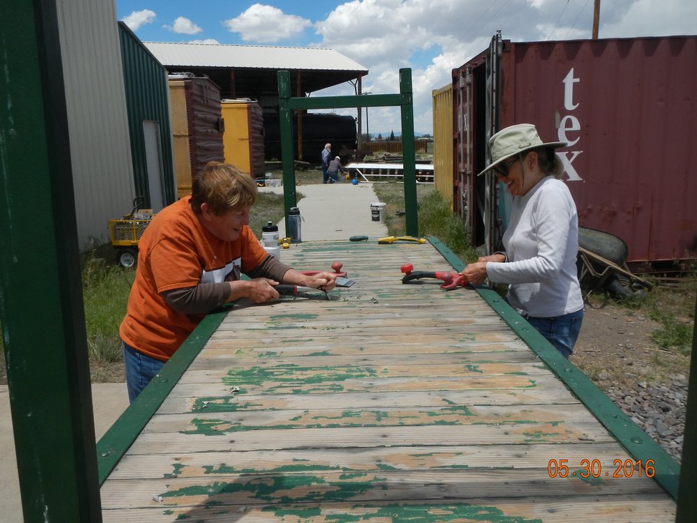 garden gals scraping paint.jpg