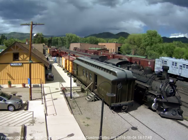 6.4.16 With storm clouds over the mountains, 489 slows for the stop.jpg