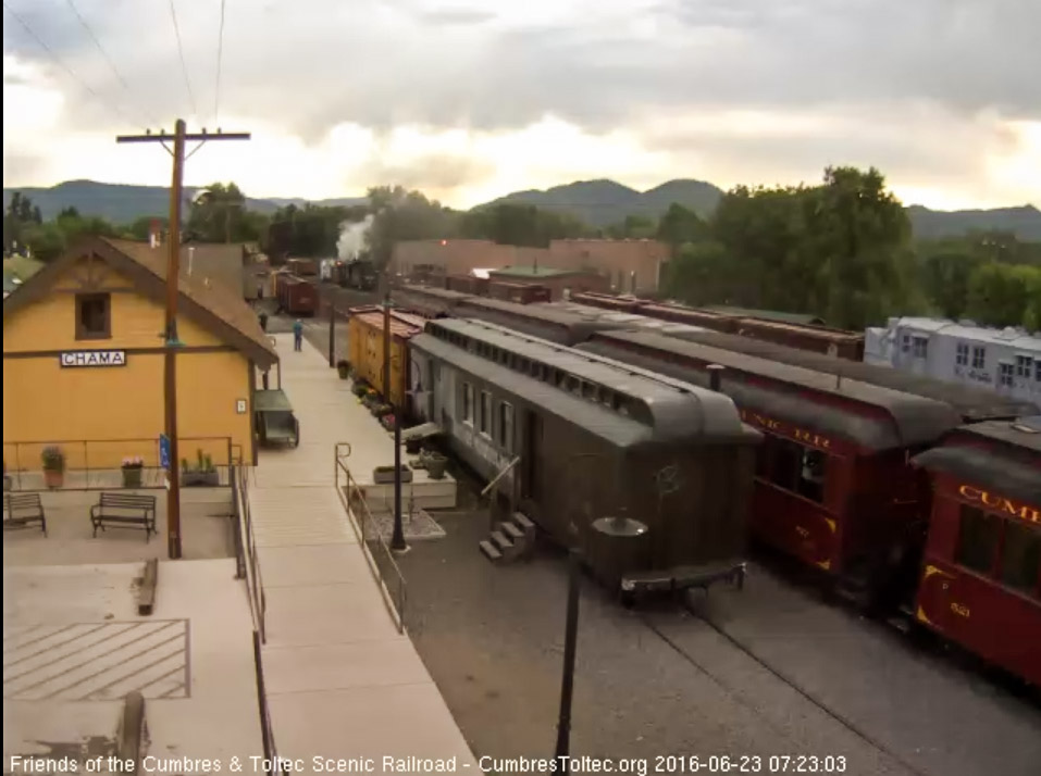 6.23.16 489 than moves forward behind a caboose and spreader.jpg